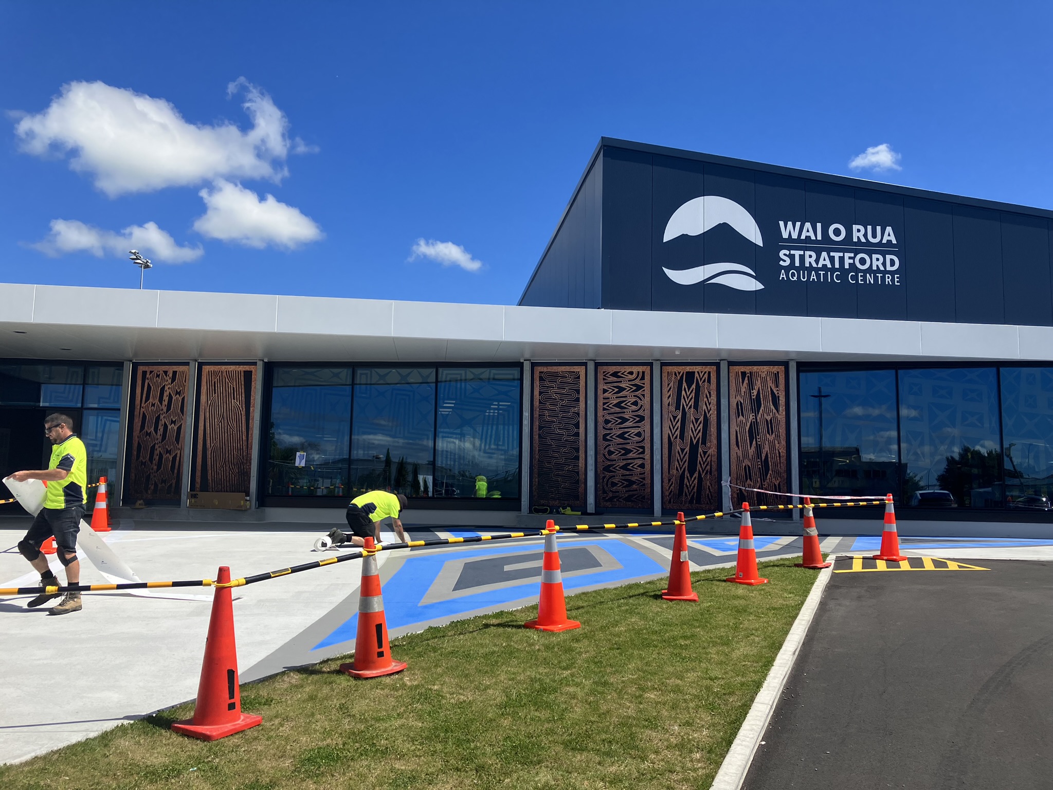 Photo of work being done on the concrete outside Wai o Rua - Stratford Aquatic Centre